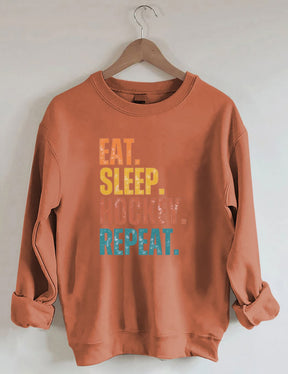 Eat Sleep Hockey Repeat Sweatshirt