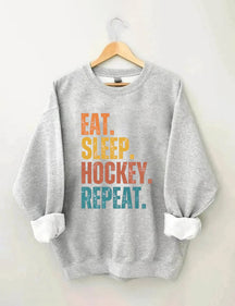 Eat Sleep Hockey Repeat Sweatshirt