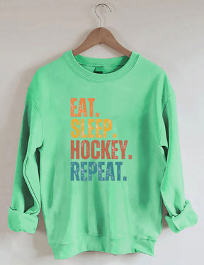 Eat Sleep Hockey Repeat Sweatshirt