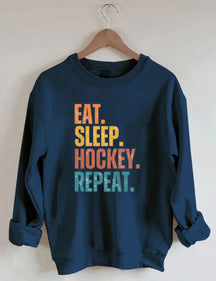 Eat Sleep Hockey Repeat Sweatshirt