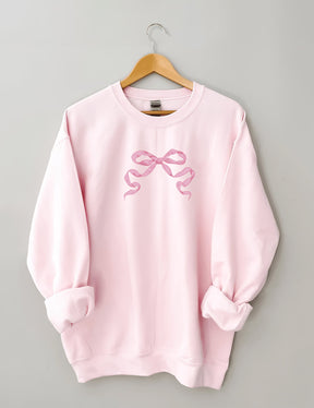 Sweat-shirt mignon avec nœud rose
