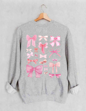 Sweat-shirt mignon avec nœud rose