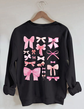 Sweat-shirt mignon avec nœud rose