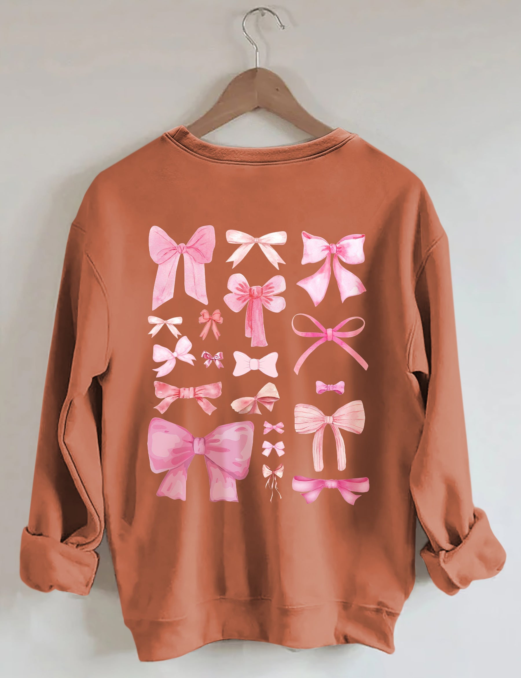 Sweat-shirt mignon avec nœud rose