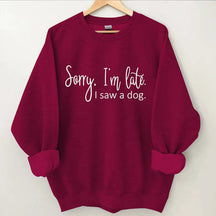 Désolé, je suis en retard, j'ai vu un sweat-shirt pour chien