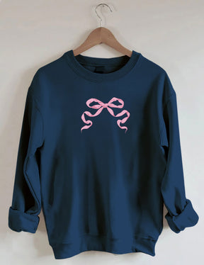Sweat-shirt mignon avec nœud rose