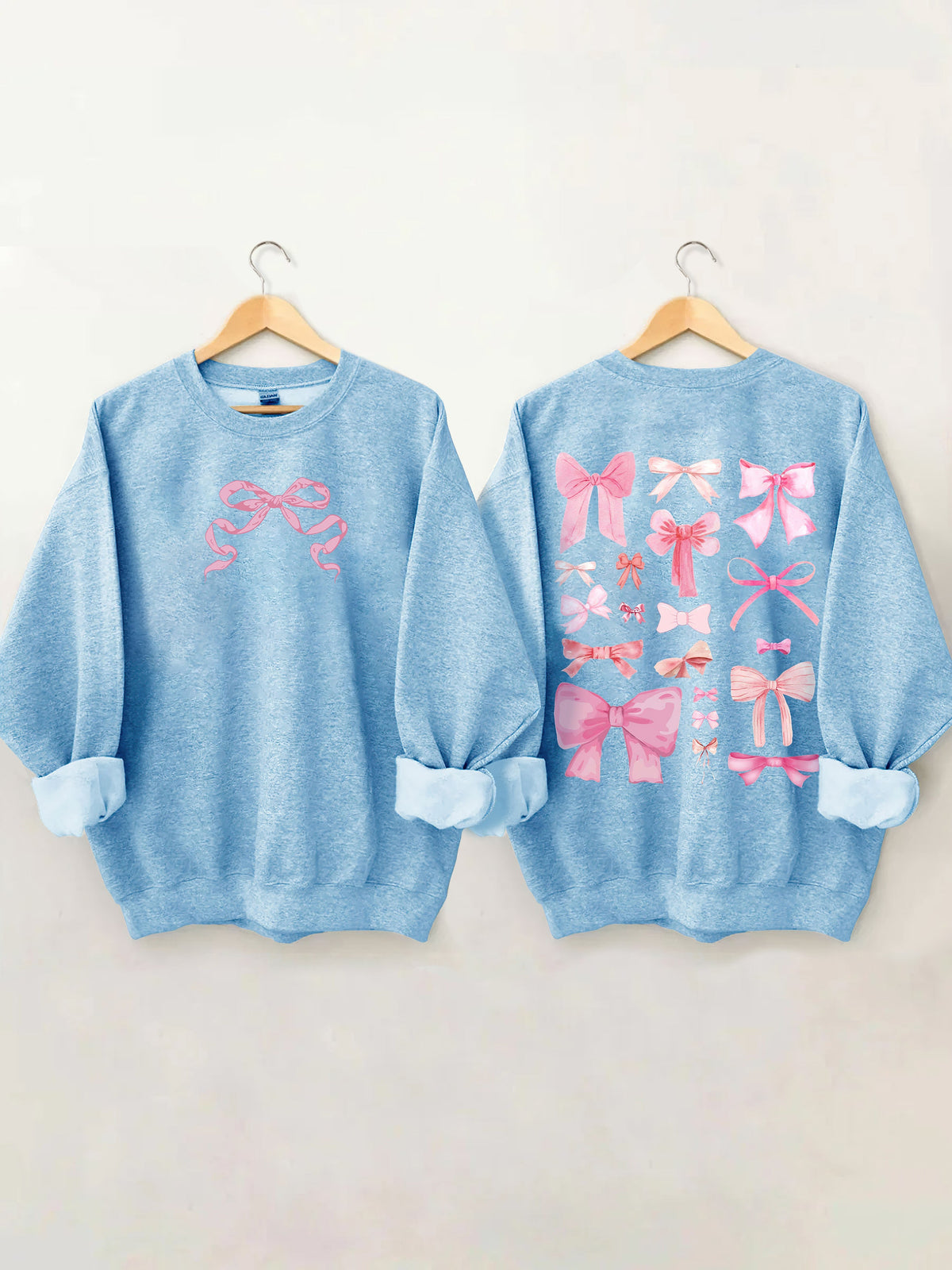 Sweat-shirt mignon avec nœud rose