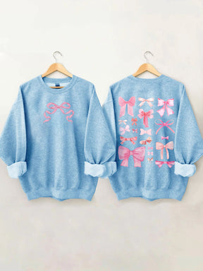 Sweat-shirt mignon avec nœud rose