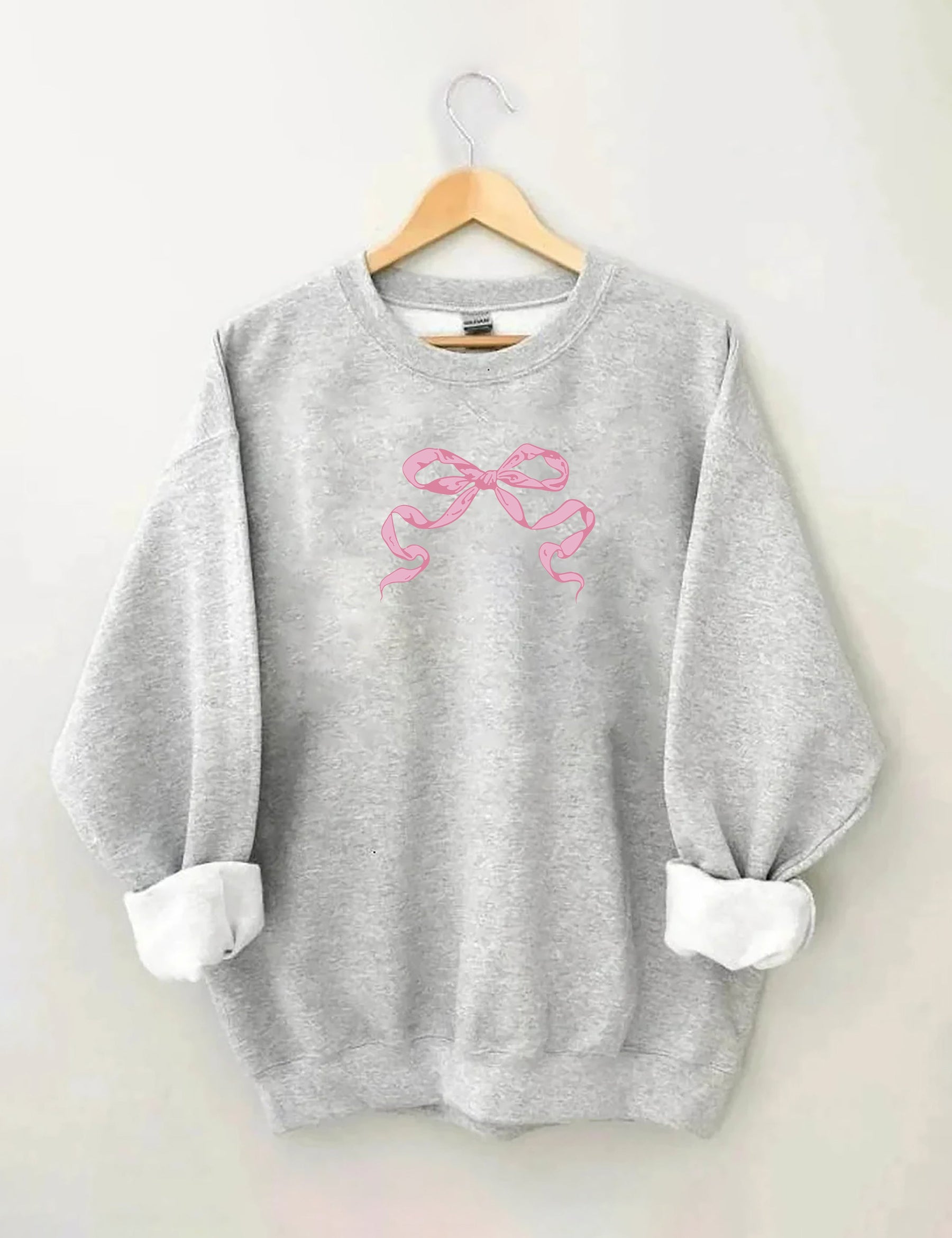 Sweat-shirt mignon avec nœud rose